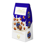 LINDT MILK CHOCOLATE EGGS WITH WHOLE ROASTED HAZELNUTS 130G